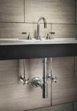 Descanso widespread faucet with carbon fiber handles in polished chrome with matching plumbing trim