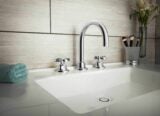 Descanso faucet with carbon fiber cross handles in polished nickel with zerodrain in sink